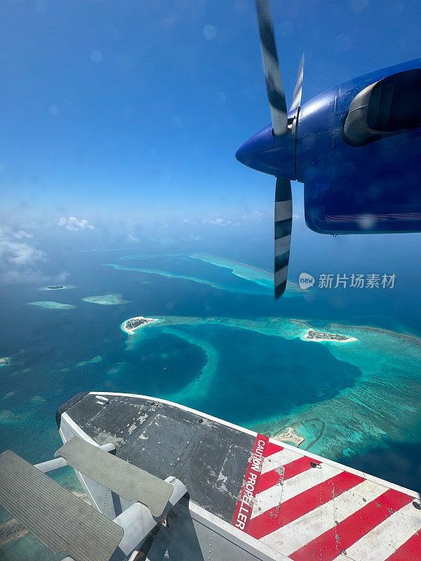 水上飞机双水獭飞机飞越马尔代夫泻湖环礁