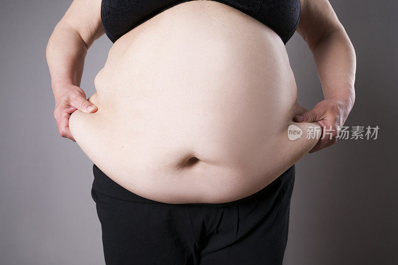 肥胖的女性身体，肥胖的女性腹部近