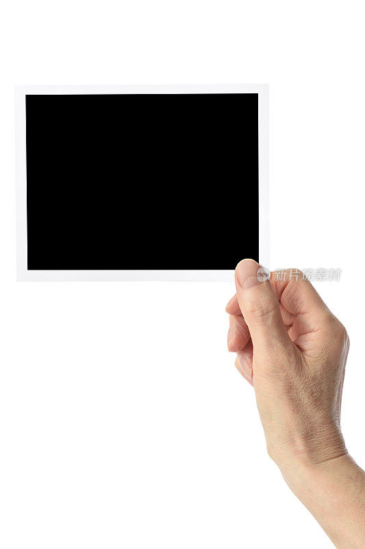孤立的镜头手握空白照片卡对白色背景