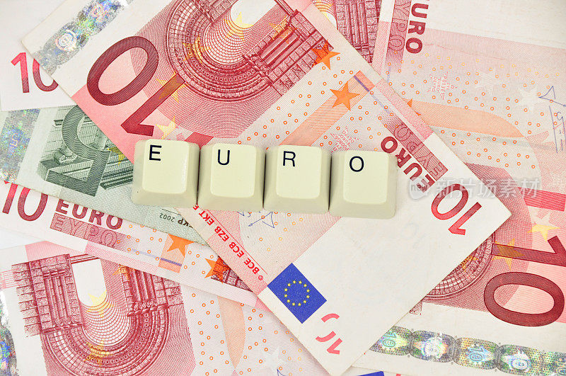 欧元的货币背景和单词欧元来自电脑按键