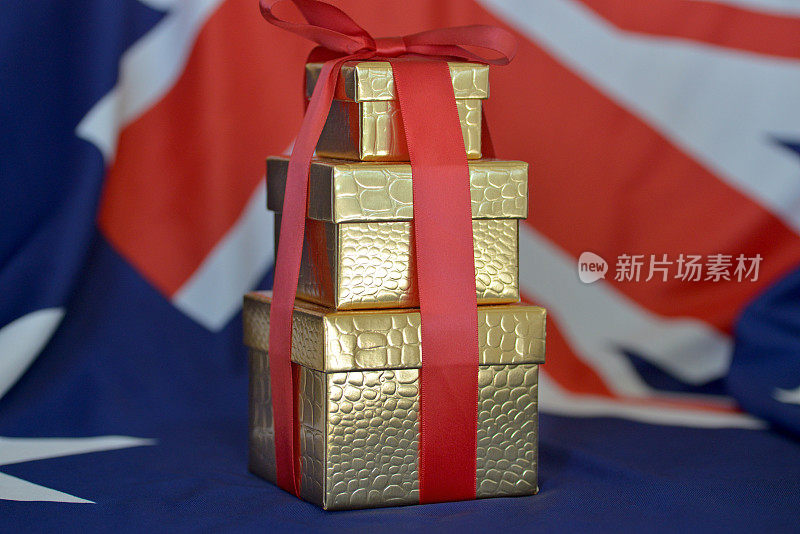 三个礼品盒叠在澳大利亚国旗上