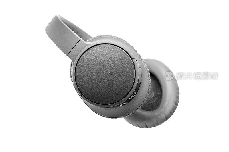 灰色无线耳机白色背景隔离近距离，大灰色蓝牙耳机设计，现代黑色wi-fi立体声耳机侧视图，高端音频音乐小玩意，电子设备
