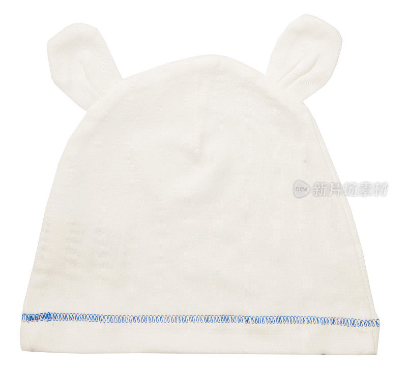 白色针织冬季羊毛帽子与绒球绒球的婴儿