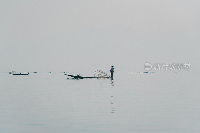 风景剪影的渔民在茵莱湖