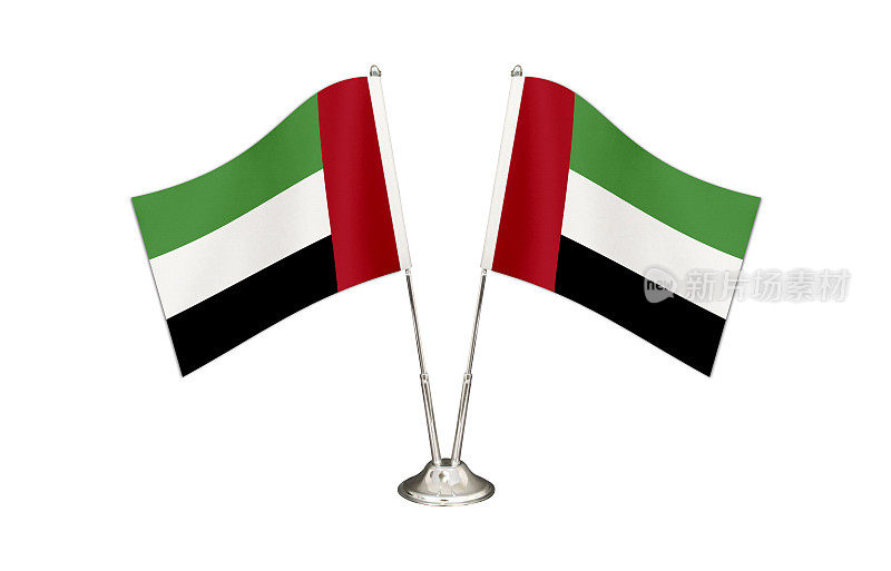 阿拉伯联合酋长国的桌旗孤立在白色的地面上。两根旗杆与旗帜和阿拉伯联合酋长国的旗帜在桌子上。