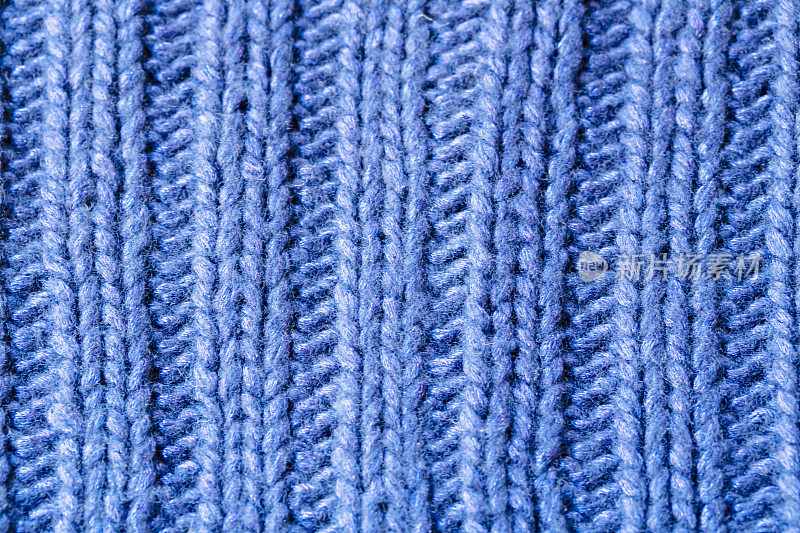 蓝色罗纹或缆线针编织毛织背景
