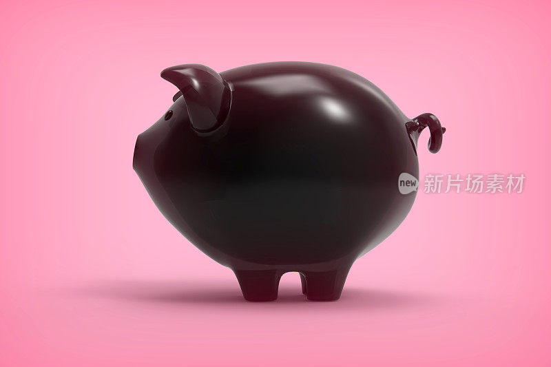 粉红色背景上的存钱罐。库存图片