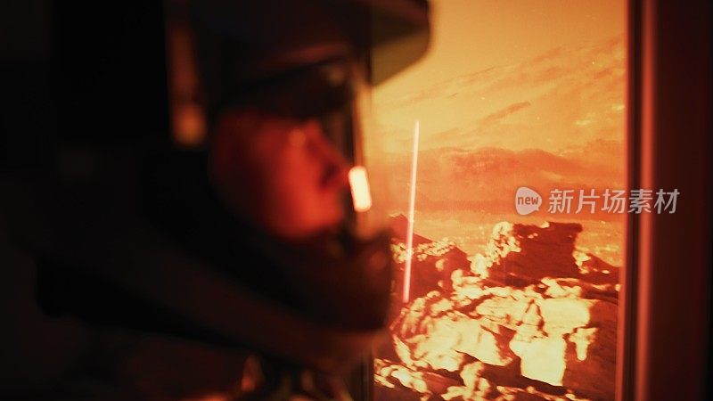 摇摇晃晃的火星探测器在红色星球火星表面旅行。宇航员望着窗外