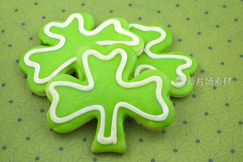 饼干三叶草叶子，绿色圣帕特里克节三叶草饼干背景