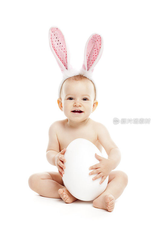 带着兔耳朵和复活节彩蛋的宝宝