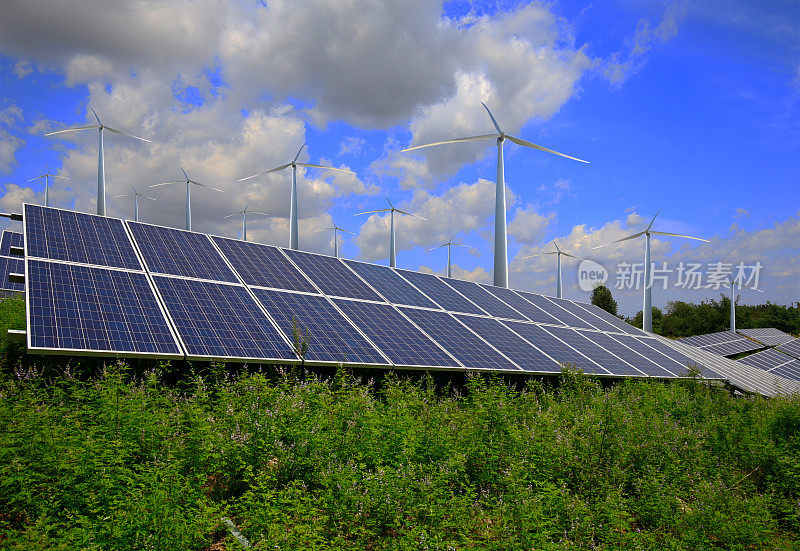 太阳能光伏电池板和风力涡轮机。能源的概念