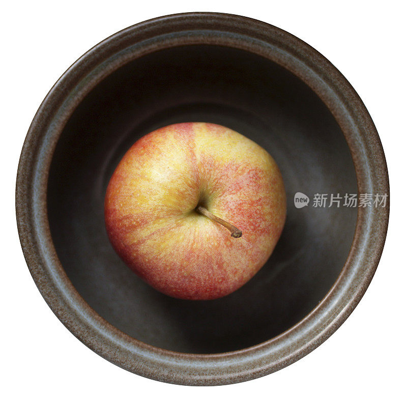 一个健康的苹果在早餐碗一天一个