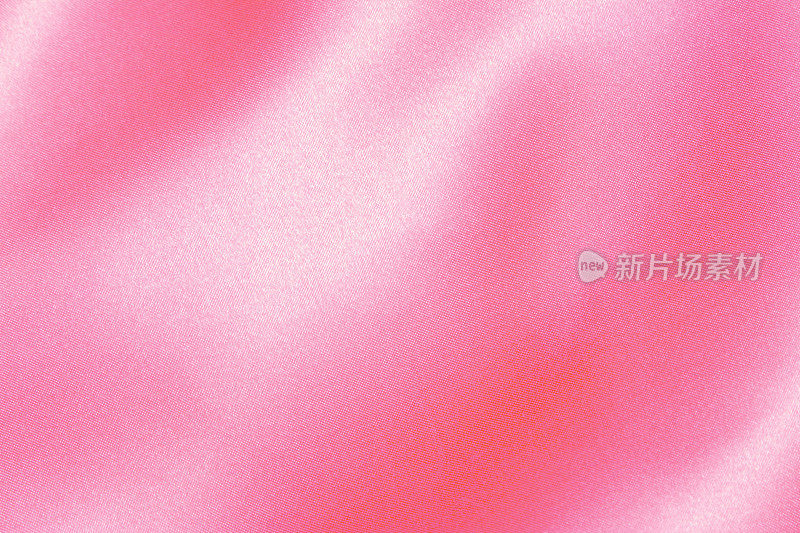粉红色的布料可以用作背景