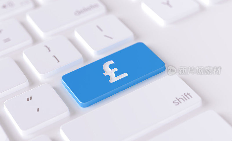 现代键盘按键与英镑图标-金融概念