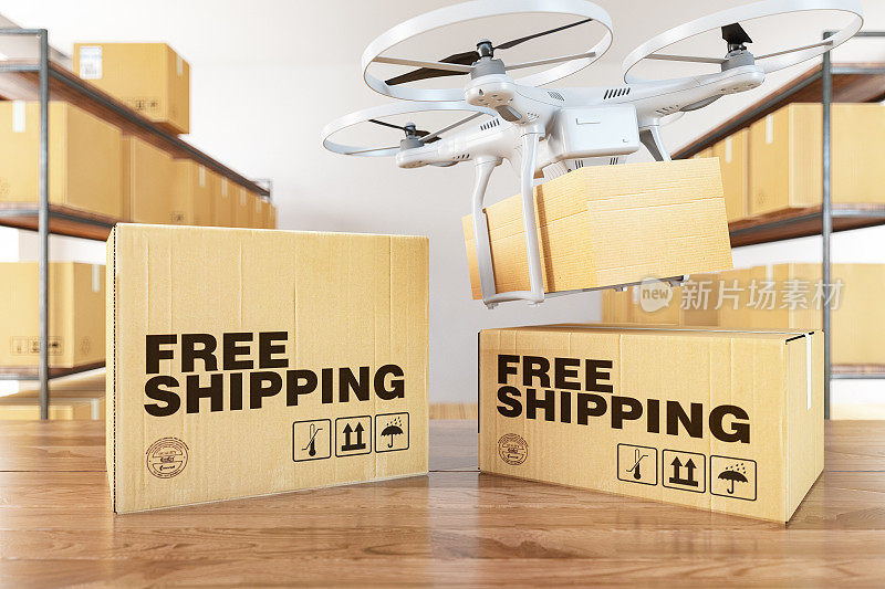 无人机携带快递包裹在仓库与免费运输纸板箱