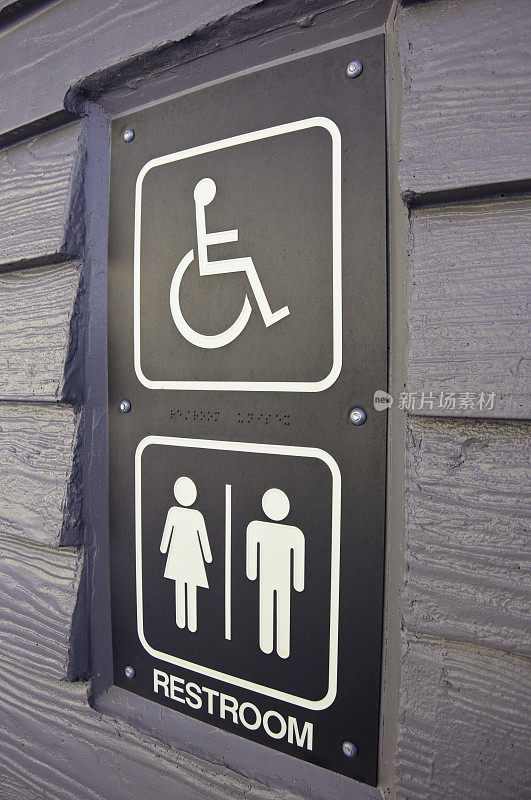 用盲文和男女符号的男女厕所标志