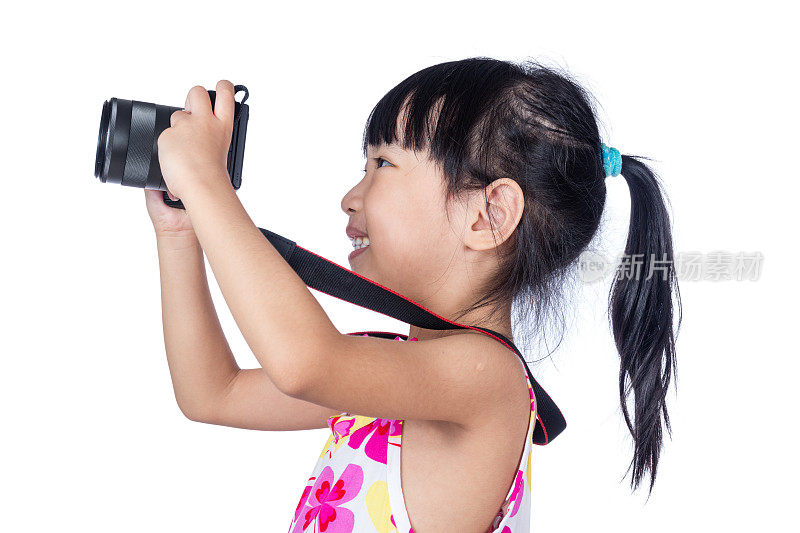 亚洲小中国女孩拿着相机