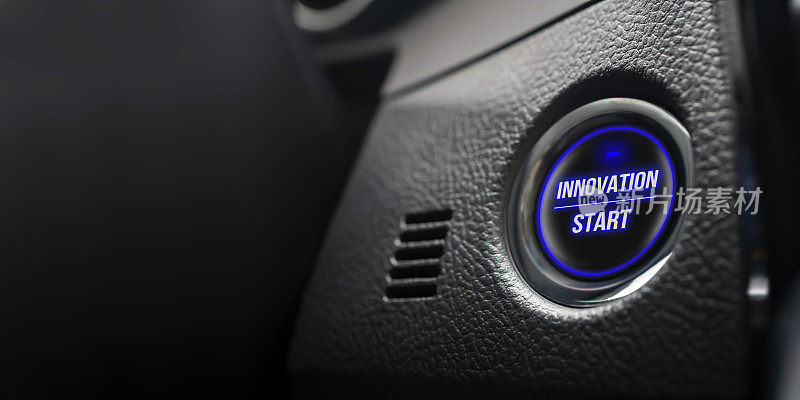 业务动机的概念。点火按钮与创新启动文本在真正的汽车仪表盘。