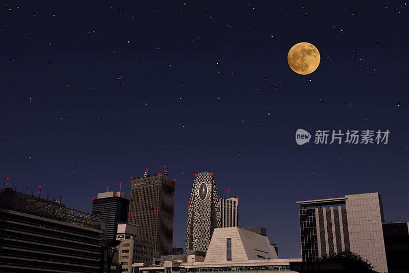 满月升起在东京新宿的天际
