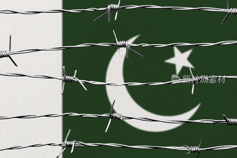 巴基斯坦国旗和铁丝网