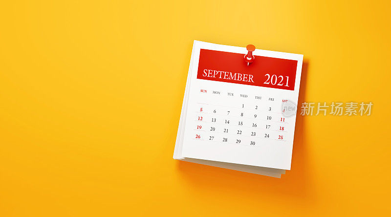 2021年9月日历贴在黄色背景上