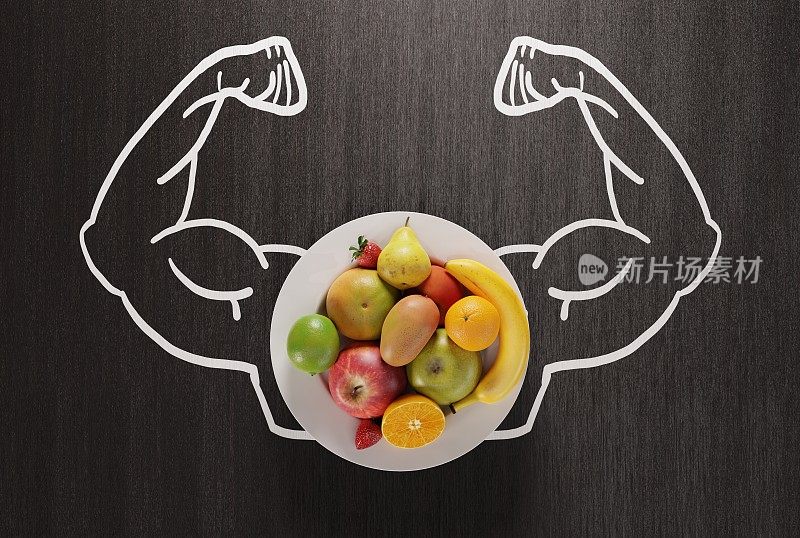 肌肉在盘子的背景与不同的水果。