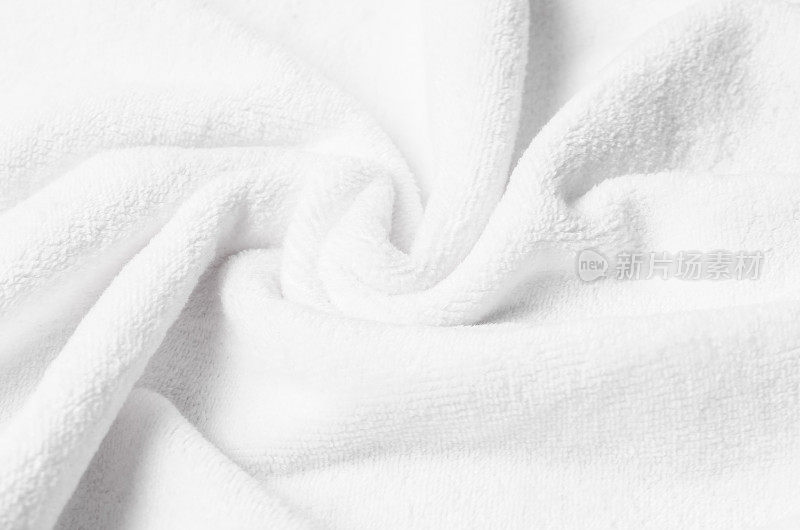 纹理的白色天然棉毛巾背景照片与选择性焦点。