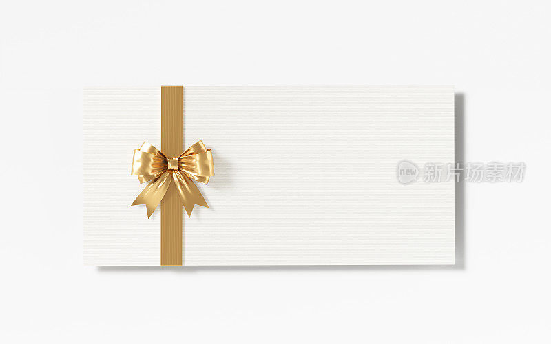 白色礼品卡与金色蝴蝶结在白色背景