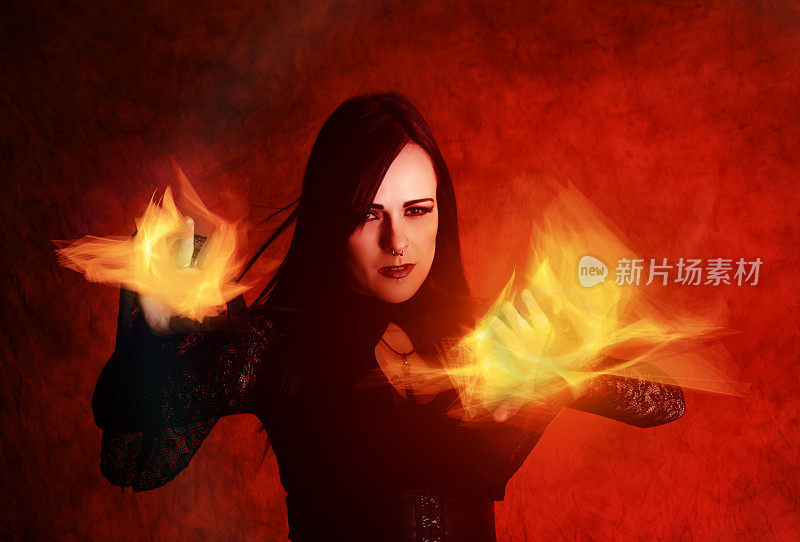黑头发的女巫掷火，横在红色上。