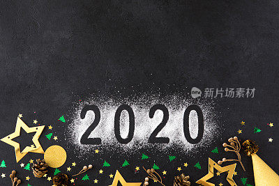 2020年新年快乐。黑色背景上的2020号符号。