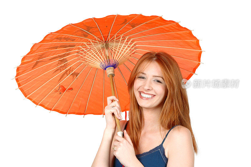 拿着阳伞的笑女人