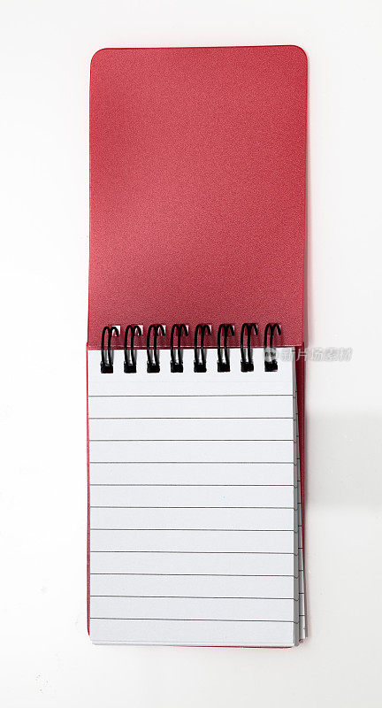 小红笔记本螺旋装订朴素的背景