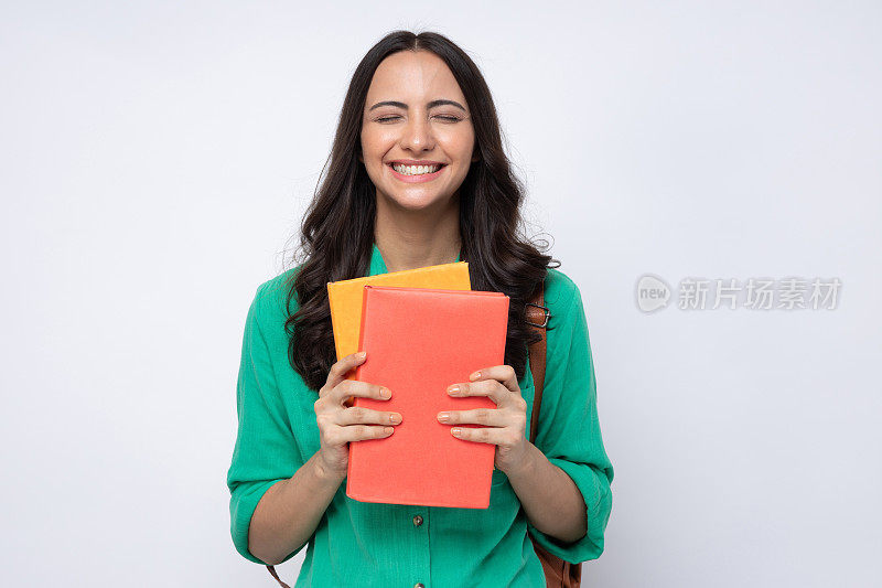 女大学生的肖像在白色背景股票照片