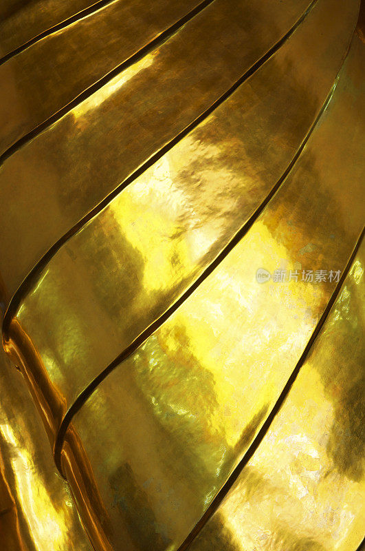 黄金佛像曲线金属背景全框架垂直