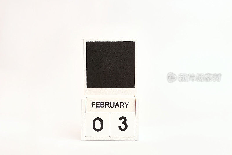 日期为2月3日的日历和设计师的空间。说明某一特定日期的事件。