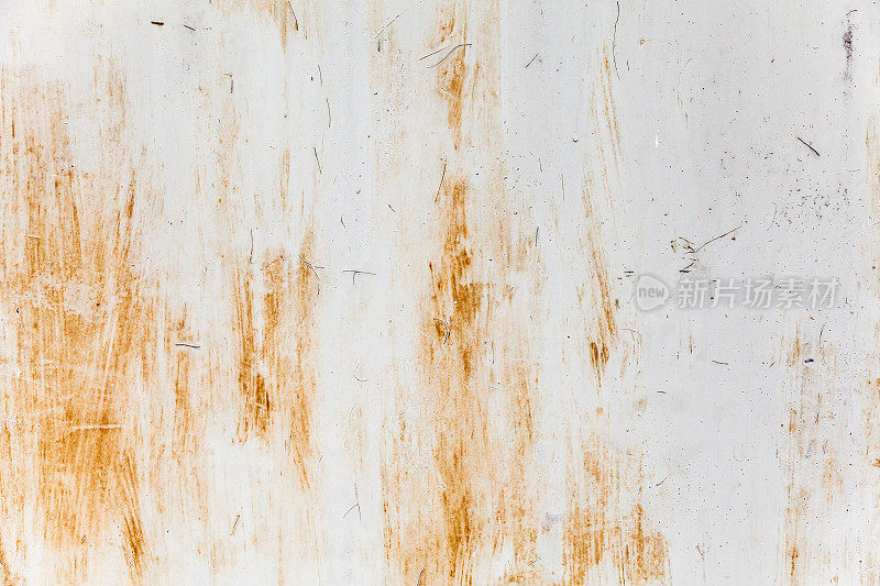 锈迹斑斑的灰色金属墙。照片背景纹理