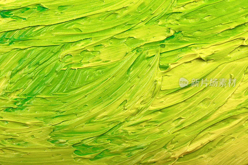 黄色和绿色油漆漩涡充满活力的颜色