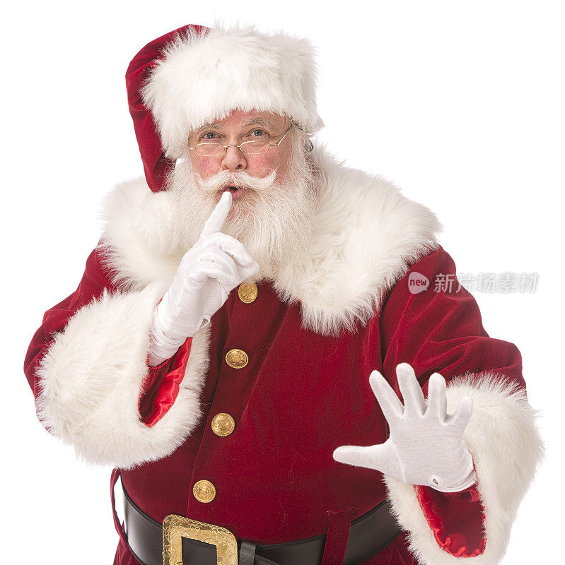 真正的圣诞老人把手指放在嘴唇上