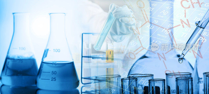 实验室研究，将液体滴入试管。实验室中含有化学液体的试管，实验室化学或科学研究开发概念。