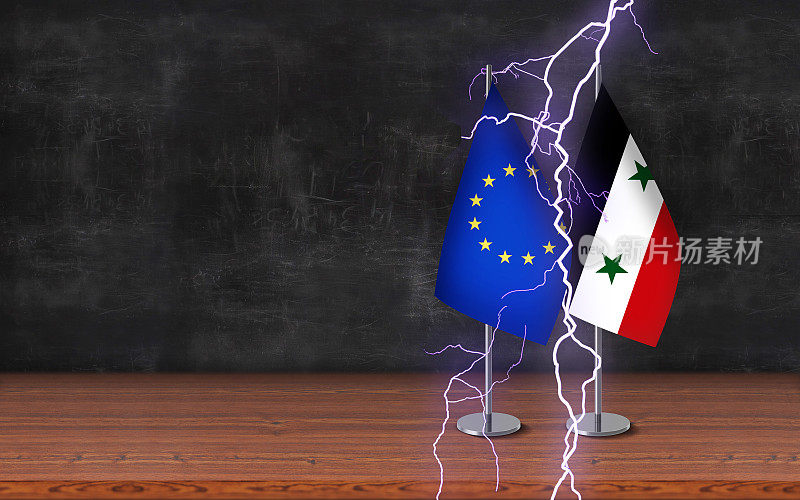 国与国冲突概念;欧盟和叙利亚的3D课桌旗帜与雷声一起立在课桌上，黑板背景前有较大的拷贝空间。