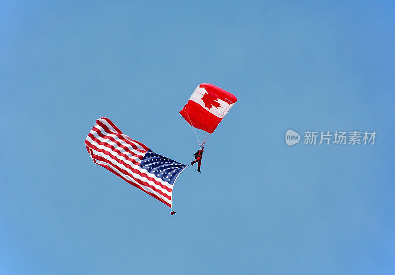 加拿大伞兵举着美国国旗