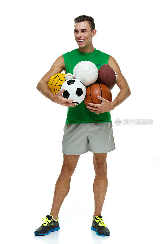 男运动员手持各种运动球