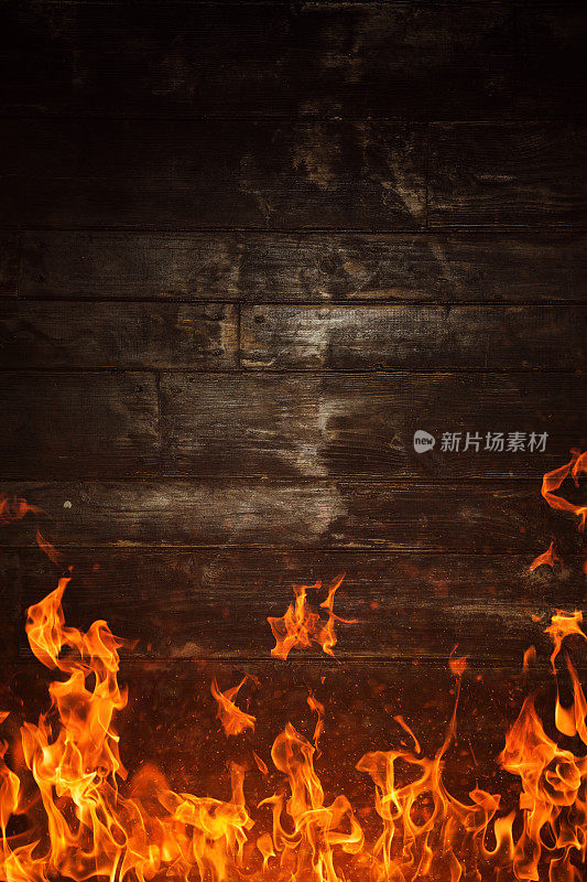 火焰和燃烧的木质纹理的背景