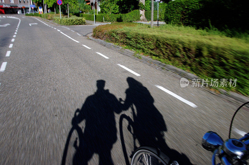 骑自行车的人的影子