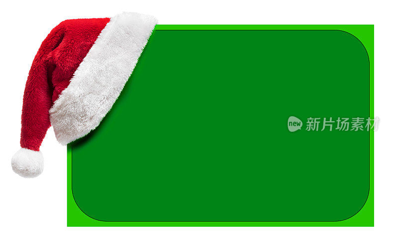 圣诞老人帽在一个绿色空白的公告牌上有拷贝空间(孤立在白色)