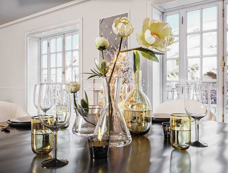 豪华的餐桌上装饰有鲜花。古典风格的豪华客厅内饰与圣诞概念。