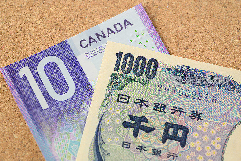 加拿大10元和日本1000日元钞票特写-货币兑换