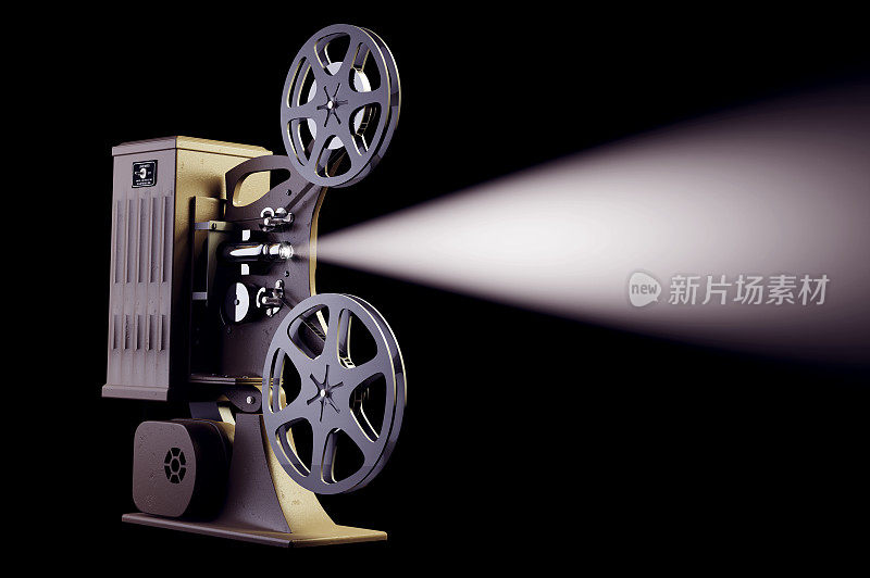 复古电影放映机与光线在黑色