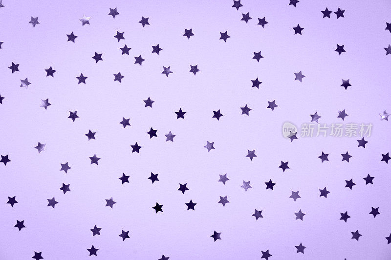 星星点缀节日背景。庆祝活动的概念。紫外光色调，2018年度流行色