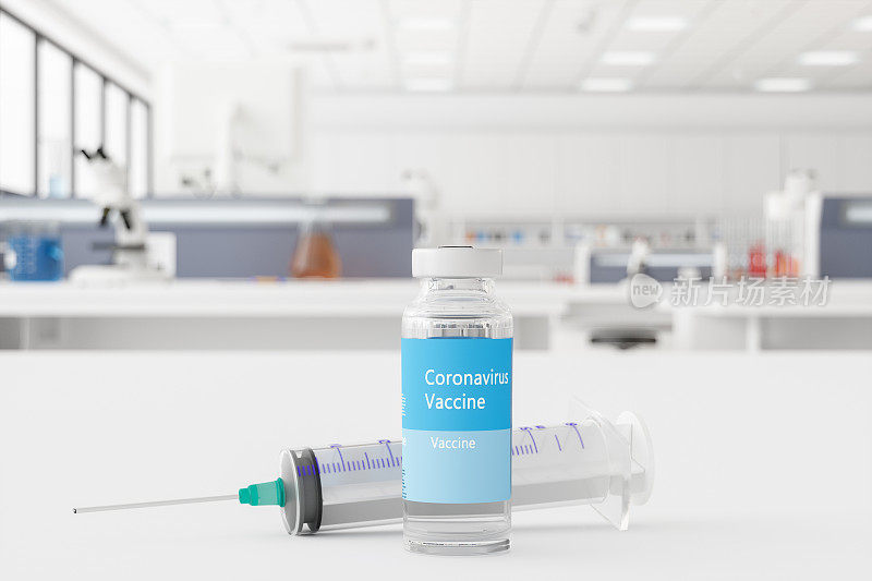 模糊的实验室背景下，桌上的Covid-19冠状病毒疫苗